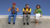 truckdrivers with girl, sitting
